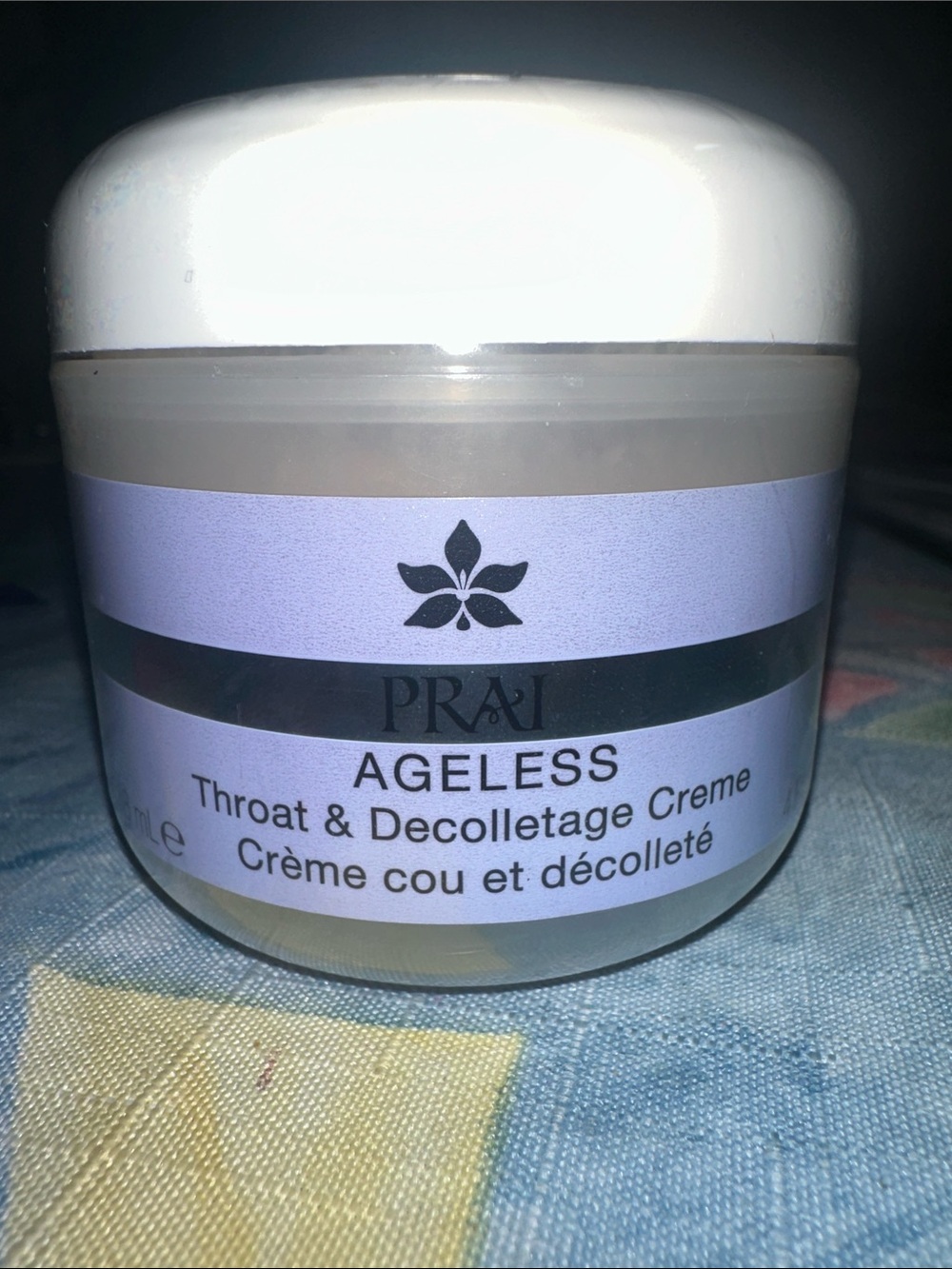 PRAI Beauty Ageless Throat/Décolletage Creme, a specialized anti-aging treatment